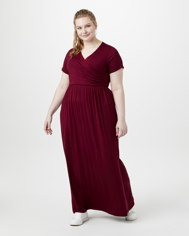 Plus size model with hourglass body shape wearing Carnation Wrap Maxi Dress by Meri Skye | Dia&Co | dia_product_style_image_id:153706